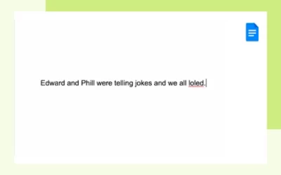 Blocco note con sfondo bianco e bordo verde chiaro che mostra del testo