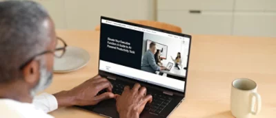 A person typing on a laptop.