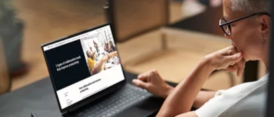 A person using a laptop.