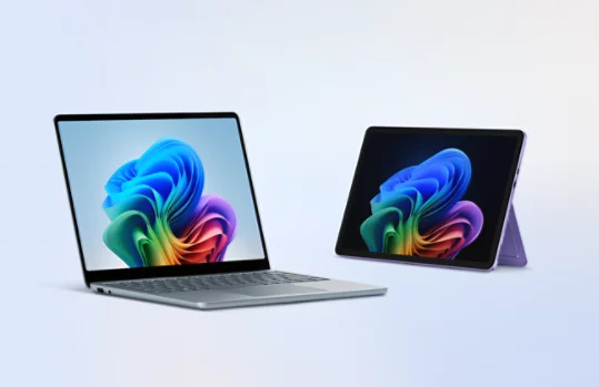 Surface Copilot+ PCs: an Ocean Surface Laptop, 13.8 inch, and a Violet Surface Pro, 12 inch.