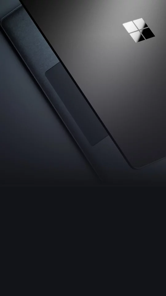 En stiliserad vy ovanifrån av en halvöppen Microsoft Surface-enhet