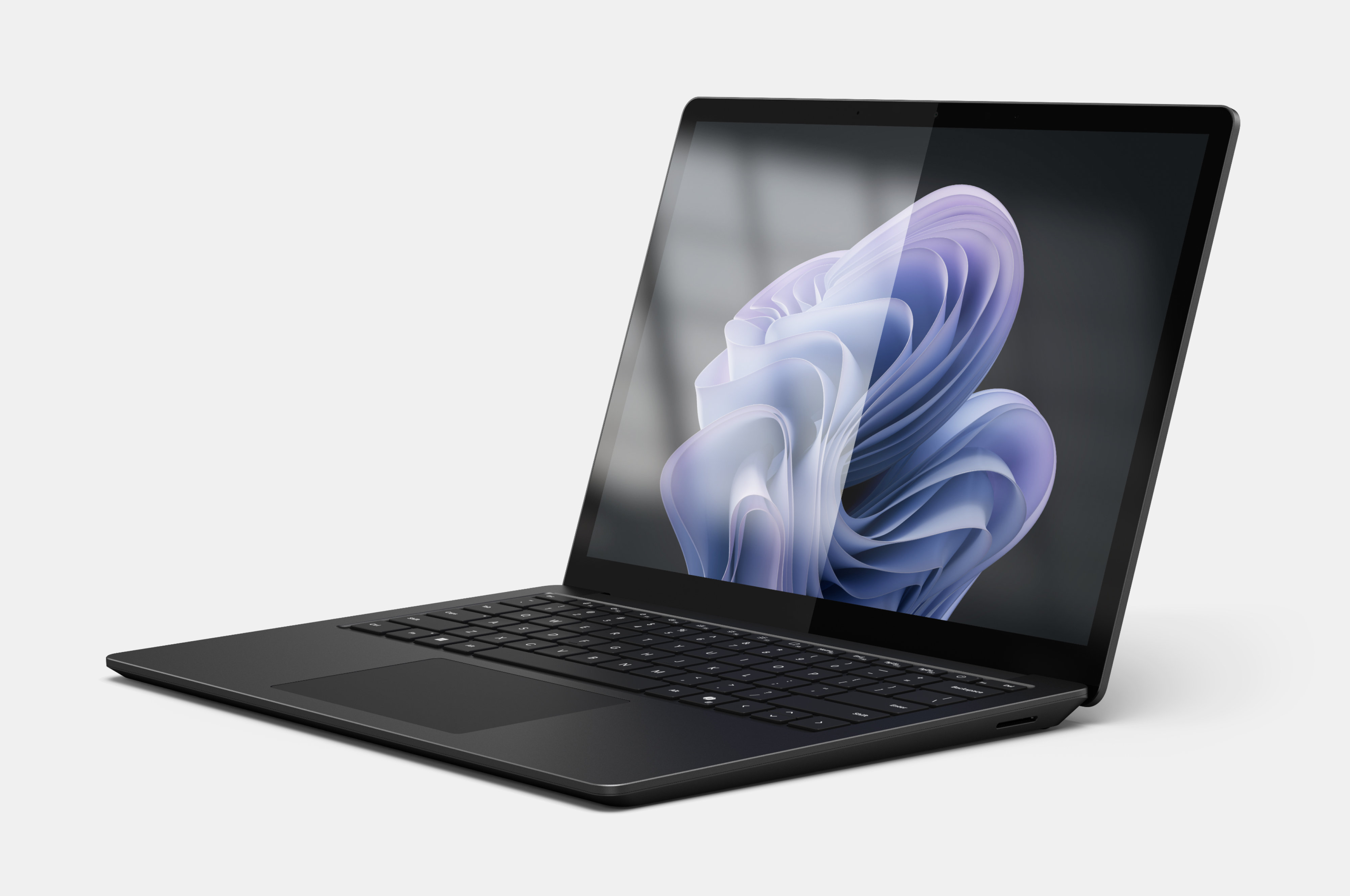 Bild på Surface Laptop 6 som visar skärmen med och utan antireflexbehandling