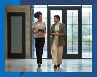 Women walking in a hallway